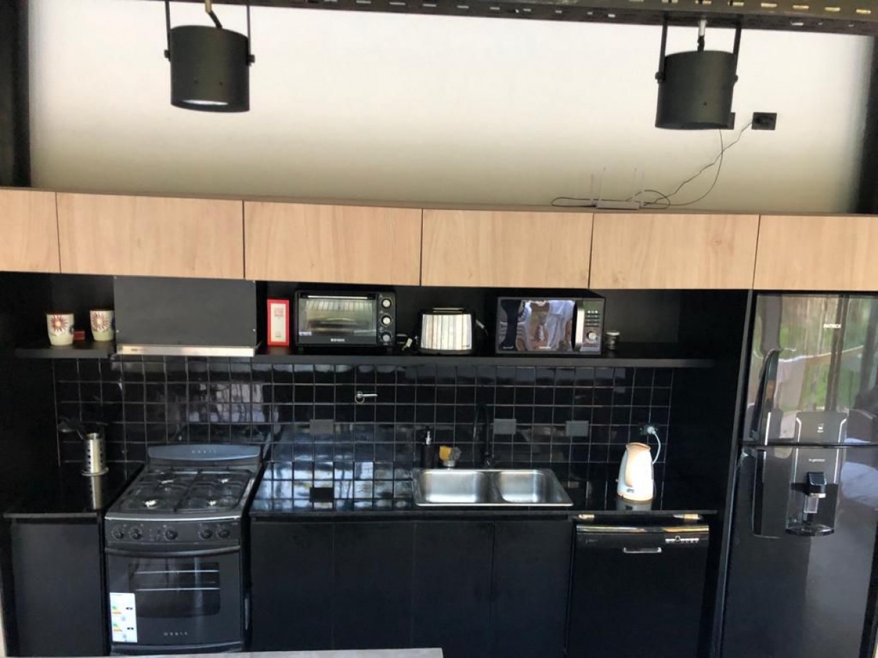 Casa en costa esmeralda, con pileta.